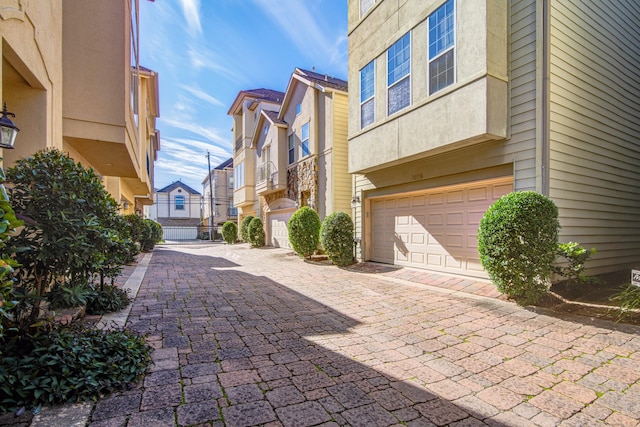 5976 Kansas St, Houston, TX 77007 - view of decorative driveway featuring a residential view