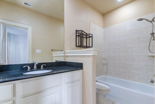 5976 Kansas St, Houston, TX 77007 - full bathroom with toilet, vanity, shower / washtub combination, and tile patterned floors