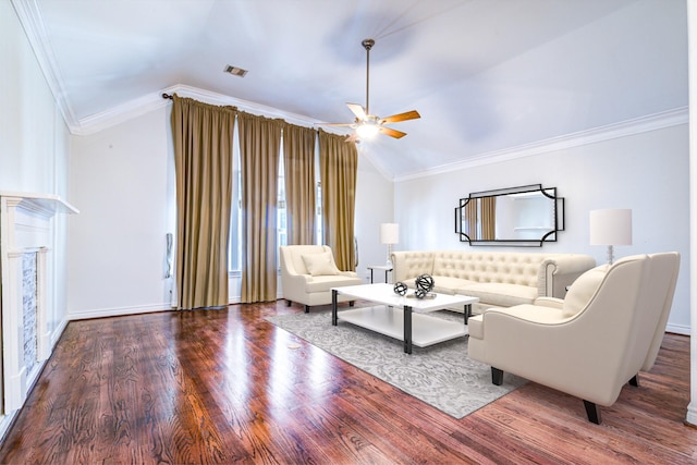 5976 Kansas St, Houston, TX 77007 - living room with vaulted ceiling, crown molding, ceiling fan, wood finished floors, and baseboards
