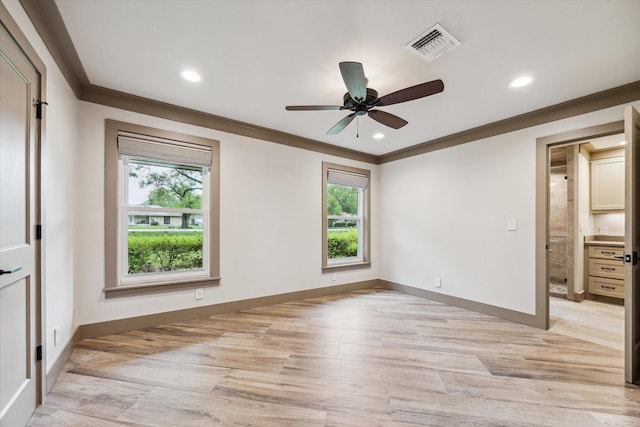 5807 Lilac St, Katy, TX 77493 - unfurnished bedroom featuring light wood-style floors, visible vents, multiple windows, and crown molding