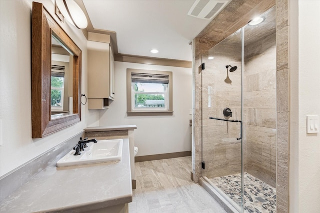 5807 Lilac St, Katy, TX 77493 - full bathroom with vanity, baseboards, a stall shower, toilet, and visible vents