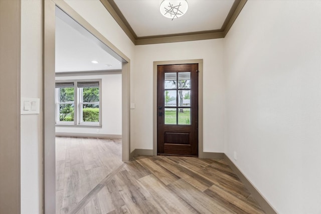 5807 Lilac St, Katy, TX 77493 - foyer entrance featuring wood finished floors, baseboards, and plenty of natural light