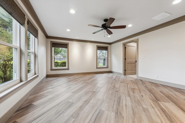 5807 Lilac St, Katy, TX 77493 - empty room with crown molding, baseboards, ceiling fan, and light wood-style floors