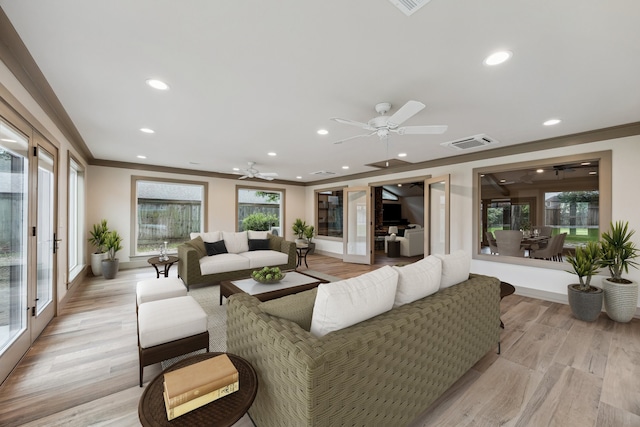 5807 Lilac St, Katy, TX 77493 - living room featuring recessed lighting, crown molding, visible vents, ceiling fan, and light wood finished floors