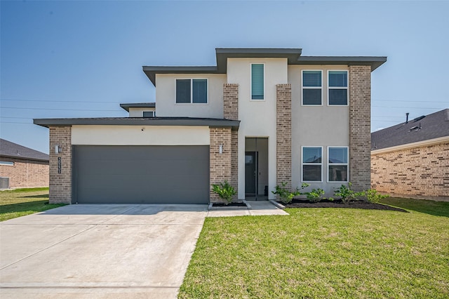 view of front of house with a front yard, concrete driveway, central air condition unit, brick siding, and stucco siding