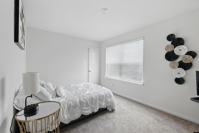 11034 Hillside Creek Dr, Humble, TX 77396 - bedroom with carpet flooring and baseboards