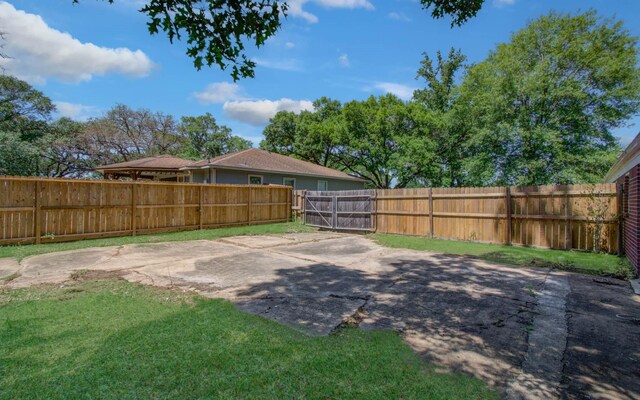 view of yard featuring fence private yard