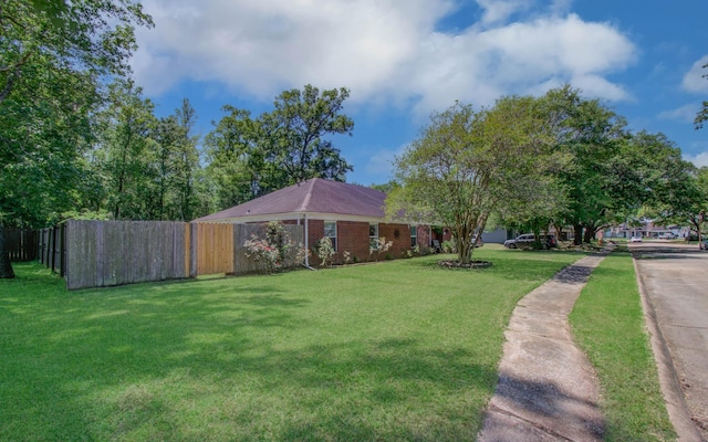 view of yard featuring fence