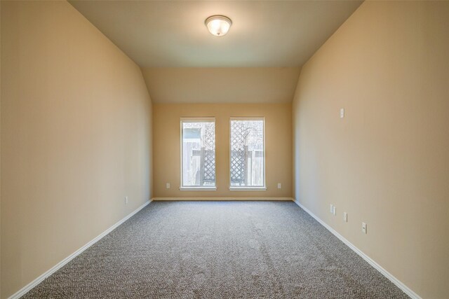 16007 Angler Bend Dr, Houston, TX 77044 - carpeted spare room with baseboards and vaulted ceiling