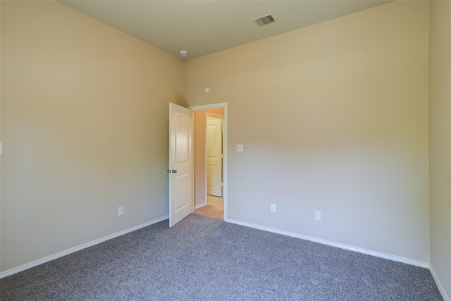16007 Angler Bend Dr, Houston, TX 77044 - empty room featuring light colored carpet, baseboards, and visible vents