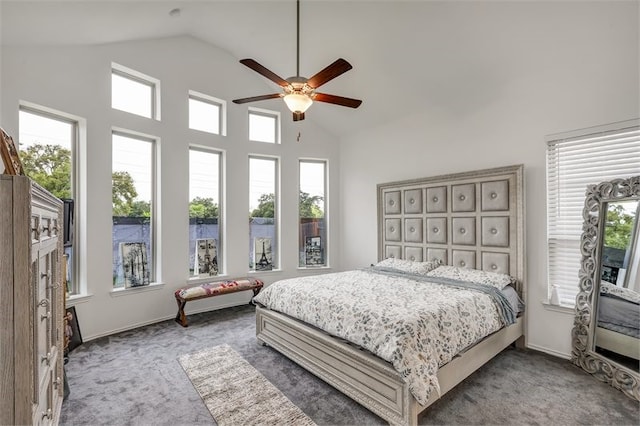 bedroom with high vaulted ceiling, carpet flooring, and a ceiling fan
