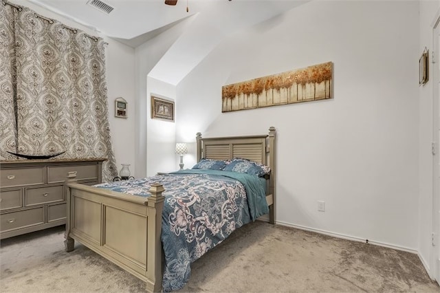bedroom with baseboards, visible vents, light colored carpet, and a ceiling fan