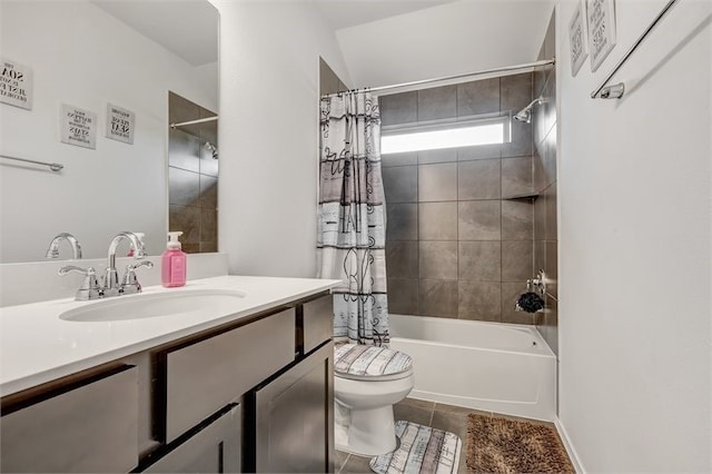 bathroom featuring tile patterned floors, shower / bath combo with shower curtain, vanity, and toilet