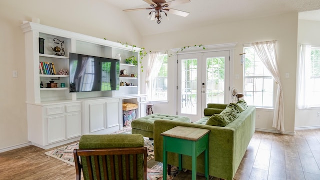 sunroom / solarium with french doors and lofted ceiling