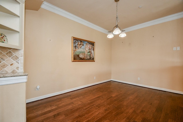 unfurnished dining area featuring dark wood-type flooring, baseboards, and ornamental molding