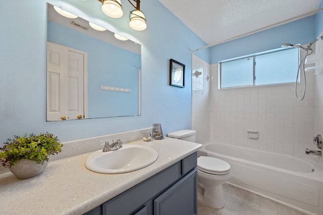 full bathroom featuring  shower combination, tile patterned floors, toilet, vanity, and visible vents