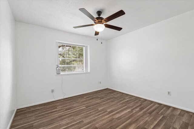 9203 Mauna Loa Ln, Houston, TX 77040 - empty room featuring baseboards, a ceiling fan, and wood finished floors