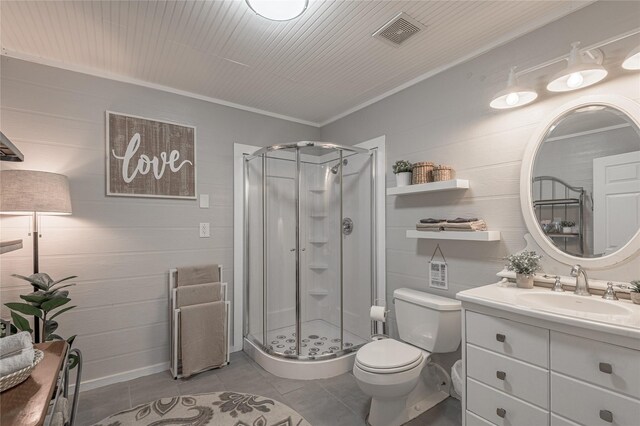 101 Tony Ln, Huntsville, TX 77320 - full bath with visible vents, a stall shower, toilet, and tile patterned flooring