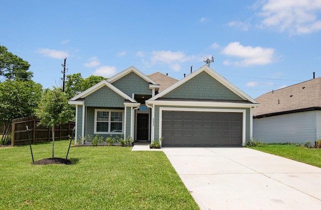 craftsman inspired home with a garage and driveway