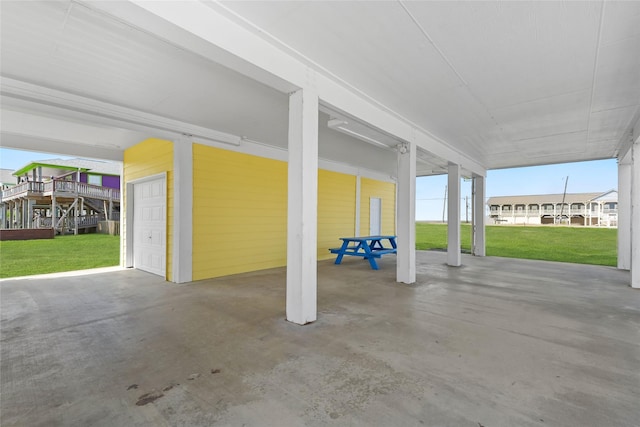1014 Blue Water Hwy, Surfside Beach, TX 77541 - view of patio with a garage