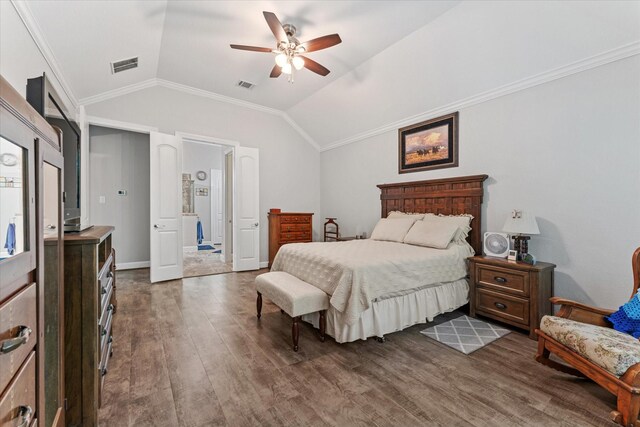137 Gray Vervain Ct, Montgomery, TX 77316 - bedroom featuring dark wood-style floors, lofted ceiling, ornamental molding, and visible vents