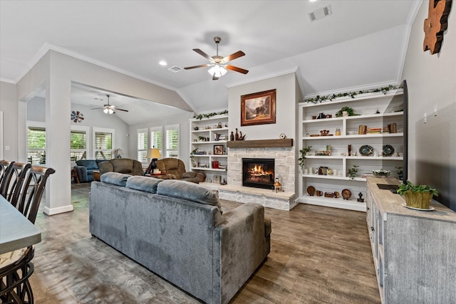 137 Gray Vervain Ct, Montgomery, TX 77316 - living room with a ceiling fan, visible vents, vaulted ceiling, and ornamental molding