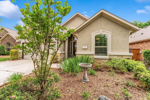 137 Gray Vervain Ct, Montgomery, TX 77316 - view of front of property featuring driveway and stucco siding