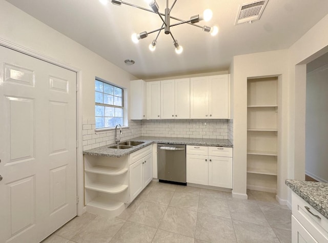 11026 Catamore St, Houston, TX 77076 - kitchen with stainless steel dishwasher, a sink, open shelves, a chandelier, and decorative backsplash
