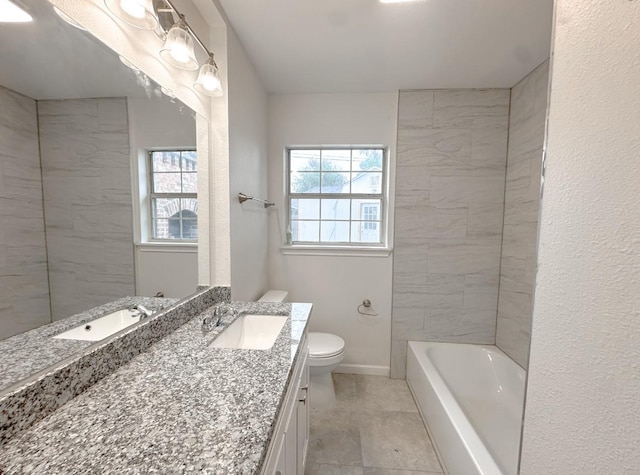 11026 Catamore St, Houston, TX 77076 - bathroom with healthy amount of natural light, toilet, vanity, and a bath
