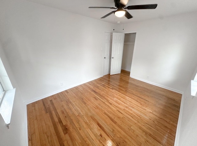 11026 Catamore St, Houston, TX 77076 - unfurnished bedroom featuring light wood finished floors, baseboards, and a closet