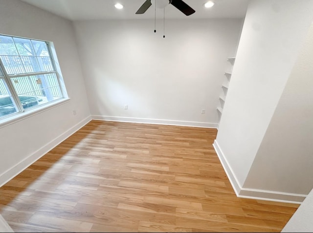 11026 Catamore St, Houston, TX 77076 - spare room featuring a ceiling fan, light wood-type flooring, baseboards, and recessed lighting