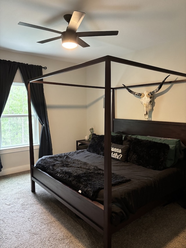 15888 Chestnut Dr, Montgomery, TX 77356 - carpeted bedroom with vaulted ceiling and a ceiling fan