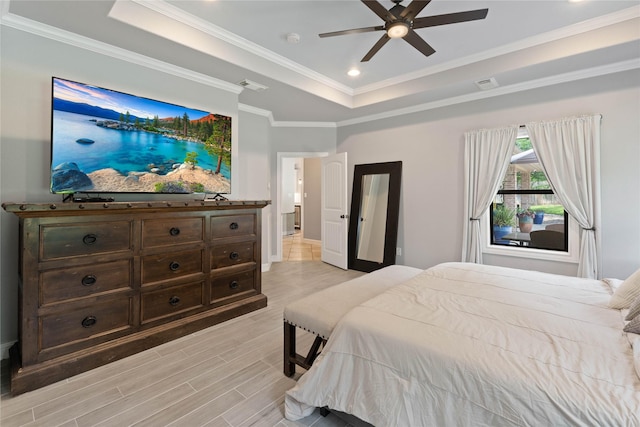1858 Stoney Brook Ct, Conroe, TX 77304 - bedroom featuring a raised ceiling, light wood finished floors, crown molding, recessed lighting, and a ceiling fan