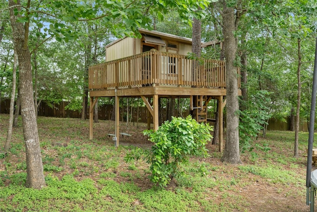 1858 Stoney Brook Ct, Conroe, TX 77304 - back of house featuring a deck