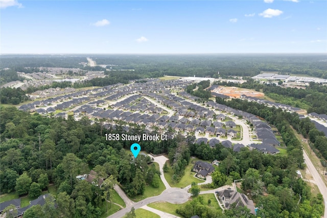 1858 Stoney Brook Ct, Conroe, TX 77304 - aerial overview of property's location with nearby suburban area