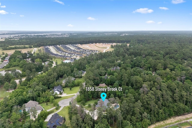 1858 Stoney Brook Ct, Conroe, TX 77304 - aerial overview of property's location featuring a forest