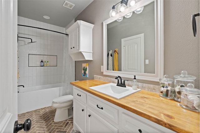1858 Stoney Brook Ct, Conroe, TX 77304 - bathroom featuring vanity, brick floors, toilet, and shower / bath combination with curtain