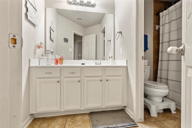full bath featuring tile patterned floors, vanity, visible vents, and toilet