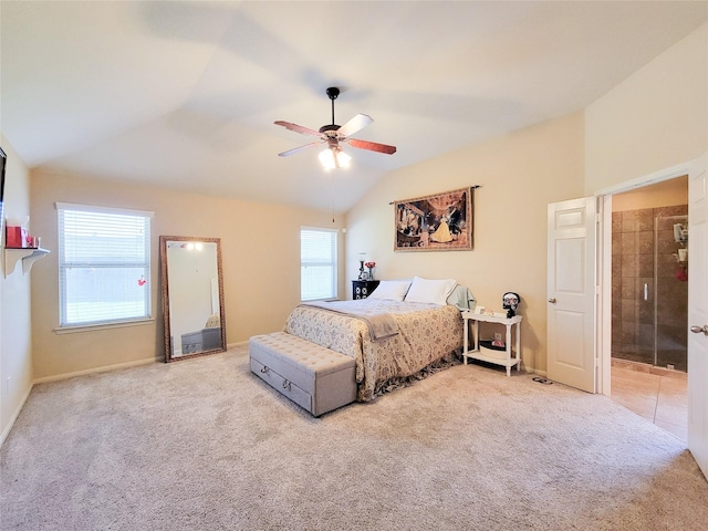 bedroom with lofted ceiling, ceiling fan, and carpet floors