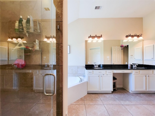 full bath with a bath, vanity, tile patterned flooring, visible vents, and a stall shower
