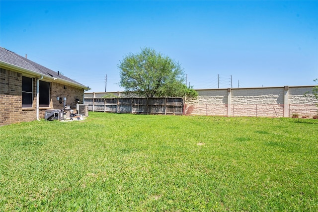 view of yard with fence