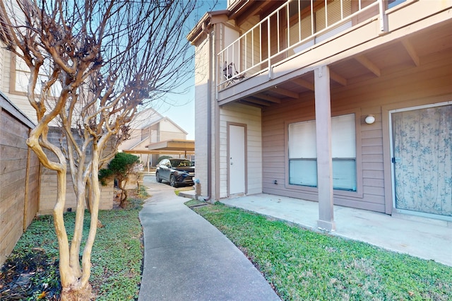 8455 Sands Point Dr Unit 40, Houston, TX 77036 - doorway to property featuring a balcony and a patio