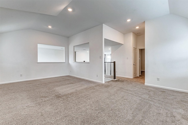 3007 Velda May Dr, Richmond, TX 77406 - carpeted empty room featuring baseboards, vaulted ceiling, and recessed lighting