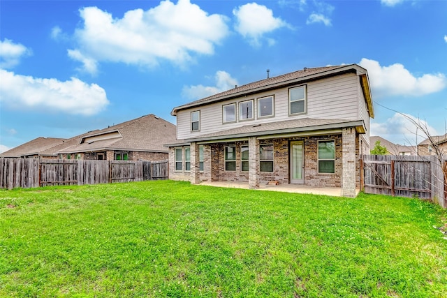 3007 Velda May Dr, Richmond, TX 77406 - back of property featuring a patio area, brick siding, a yard, and a fenced backyard