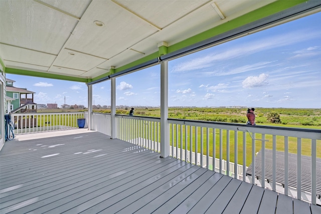 4102 Kiva Rd, Galveston, TX 77554 - wooden terrace featuring a lawn