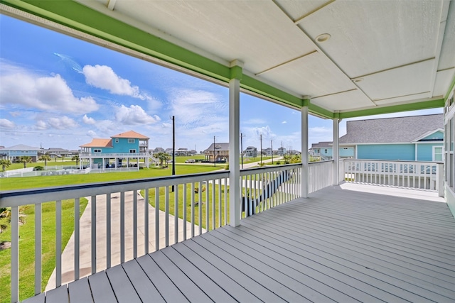 4102 Kiva Rd, Galveston, TX 77554 - wooden terrace featuring a residential view and a yard