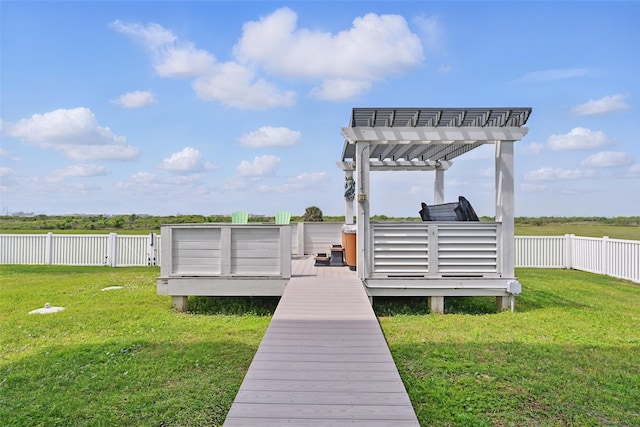 4102 Kiva Rd, Galveston, TX 77554 - dock area with a wooden deck, a pergola, fence, and a lawn