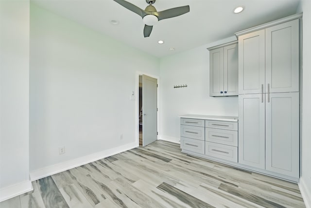 4102 Kiva Rd, Galveston, TX 77554 - unfurnished bedroom with recessed lighting, light wood-style flooring, baseboards, and a ceiling fan
