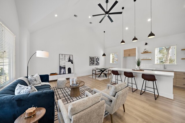 845 Elkhart St Unit C, Houston, TX 77091 - living area with high vaulted ceiling, light wood-type flooring, recessed lighting, and ceiling fan