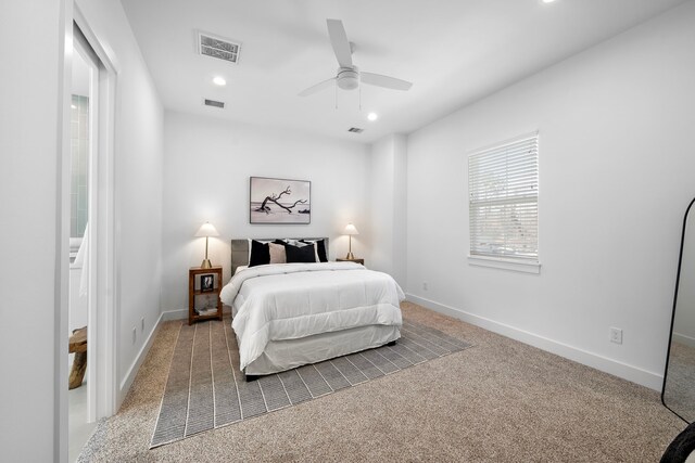 845 Elkhart St Unit C, Houston, TX 77091 - carpeted bedroom with baseboards, recessed lighting, and a ceiling fan